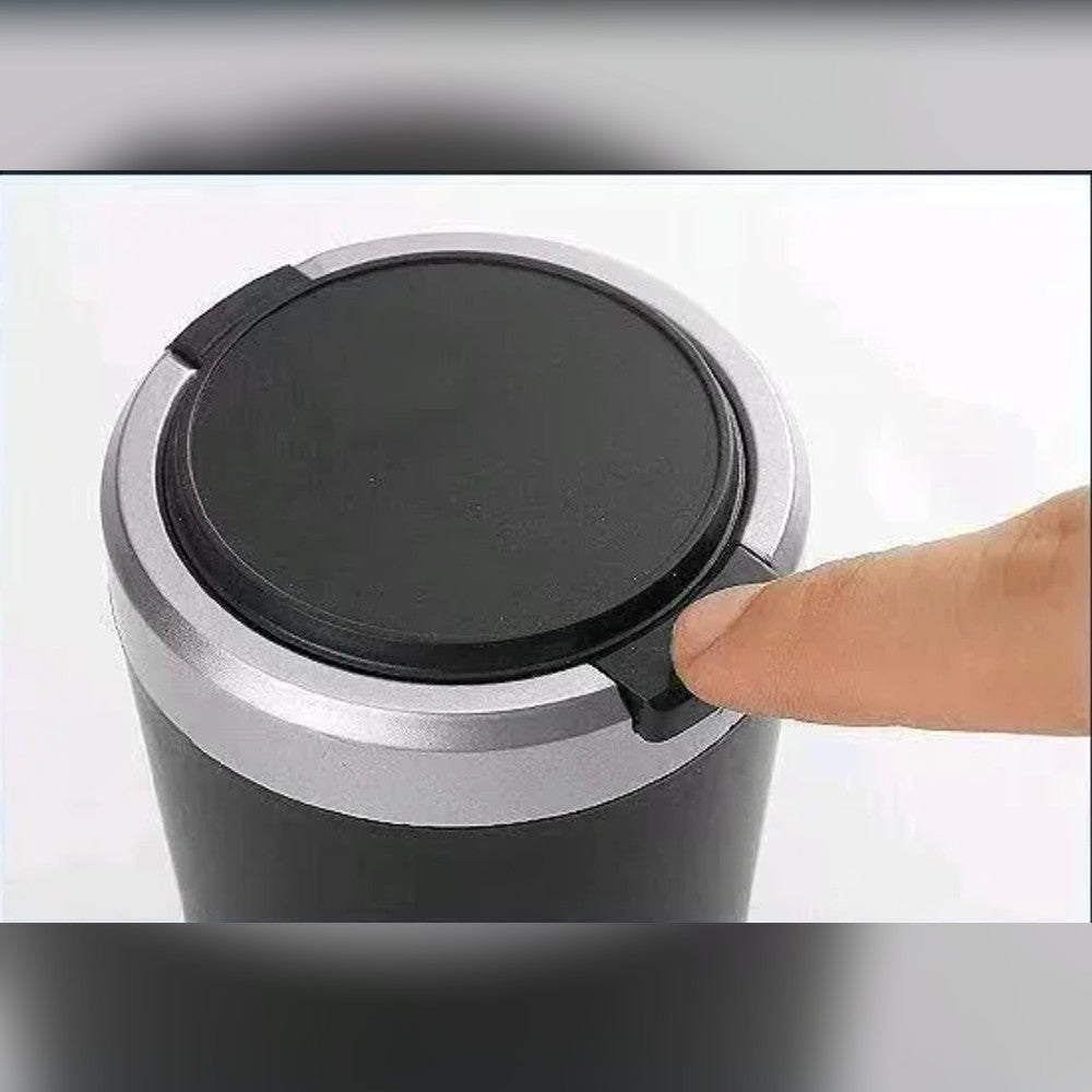 Ét tryk på knappen åbner låget
