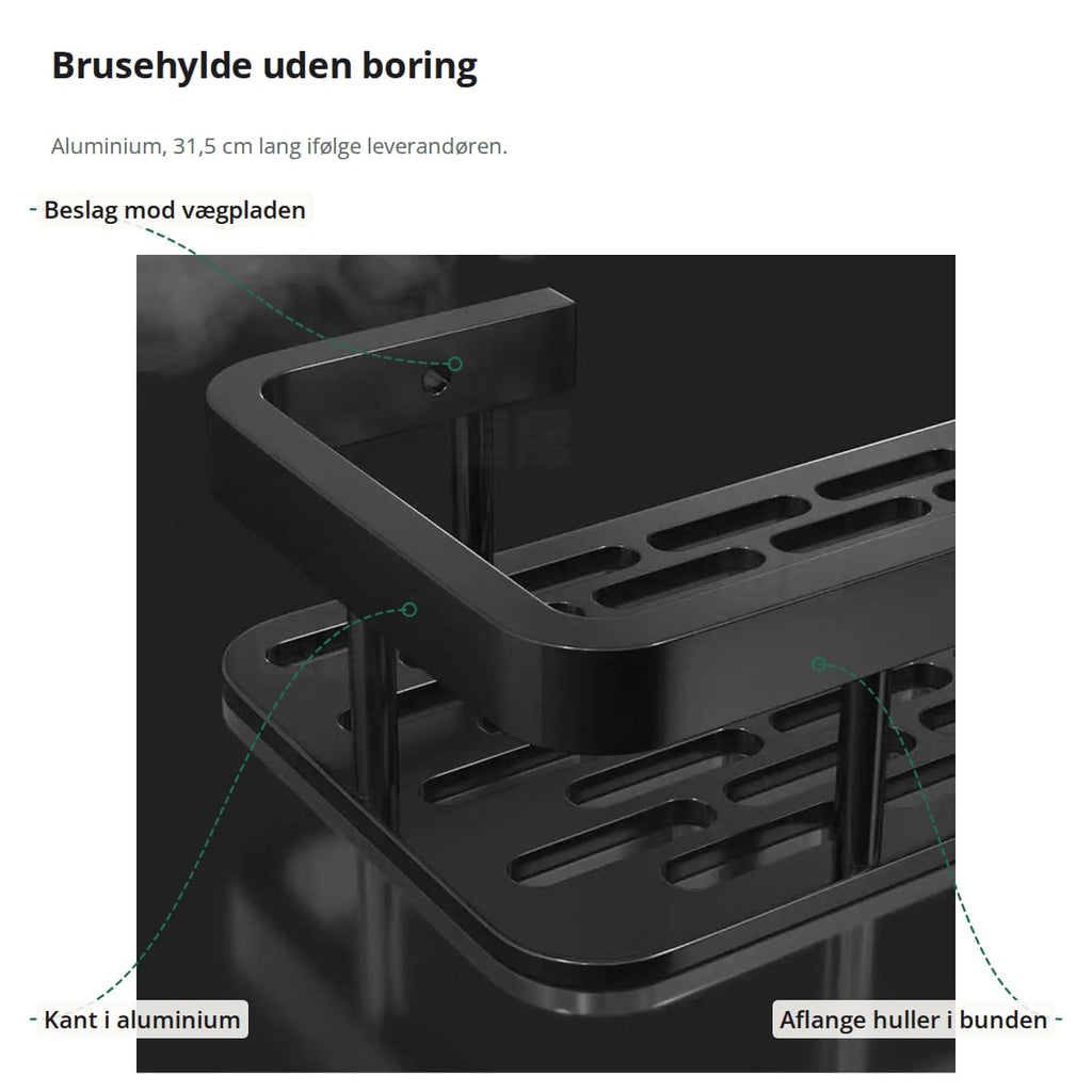 Nærbillede af brusehylden med markeringer: beslaget mod vægpladen, kanten i aluminium og de aflange huller i bunden