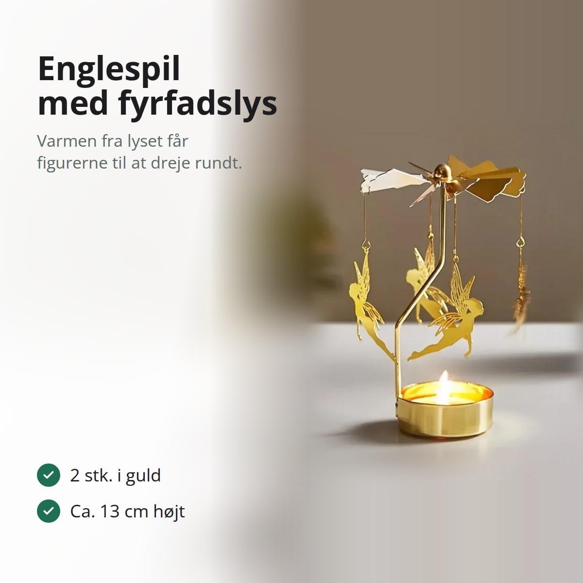 Englespil i guld med tændt fyrfadslys, med teksten: 2 stk. i guld, ca. 13 cm højt