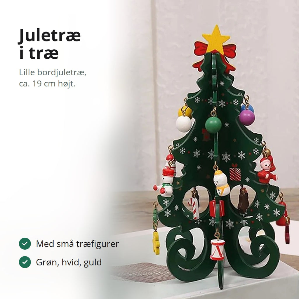 Lille juletræ i træ med stjerne, sløjfe og små pyntefigurer i træ, med teksten: lille bordjuletræ på ca. 19 cm