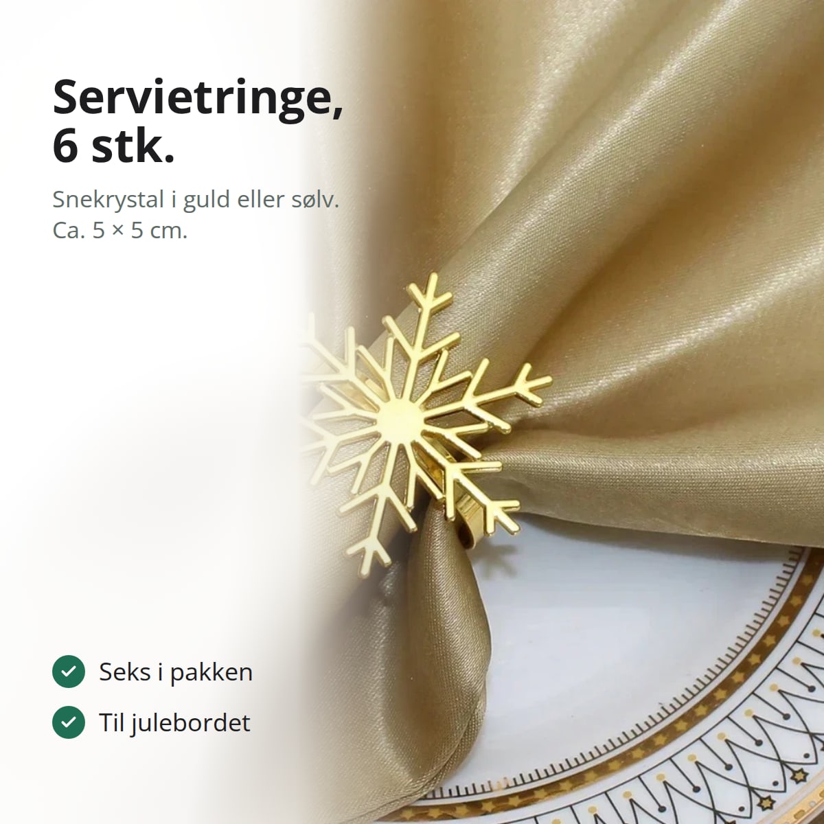 Seks servietringe med snekrystal i guld på et julebord