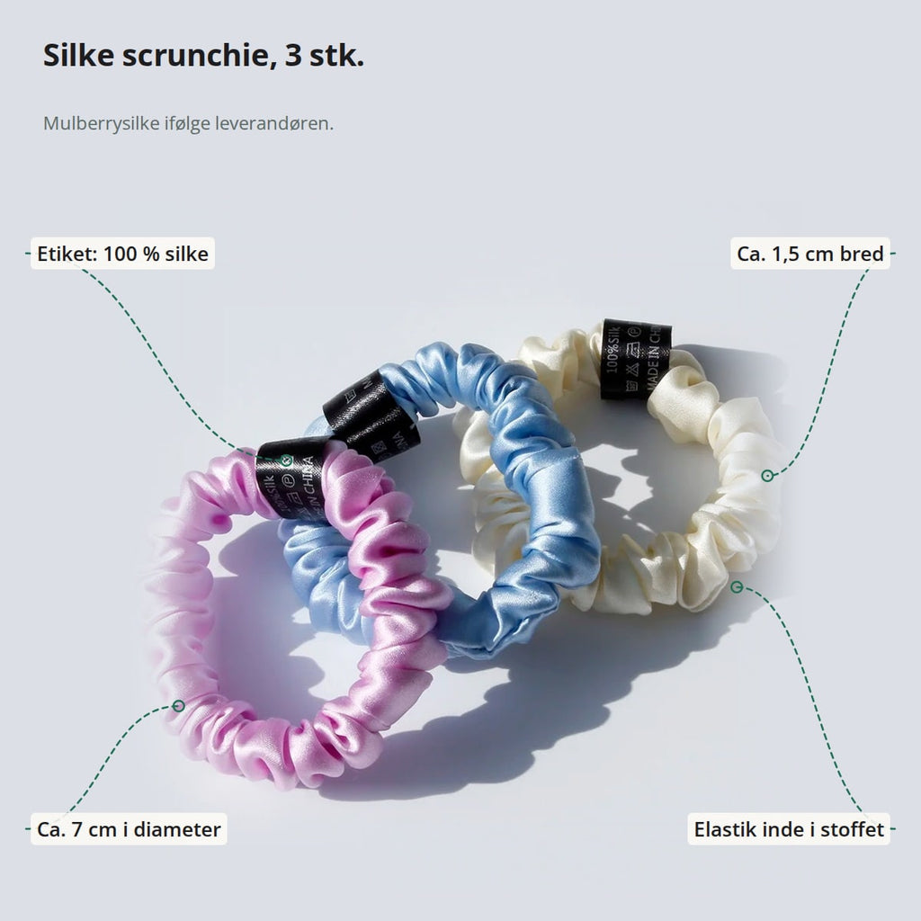 Tre silke scrunchies med markeringer: etiket 100 % silke, bredde ca. 1,5 cm, elastik inde i stoffet og diameter ca. 7 cm