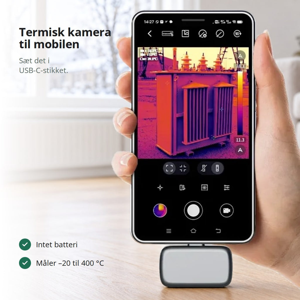 Termisk kamera i USB-C-stikket på en telefon med et varmebillede i appen