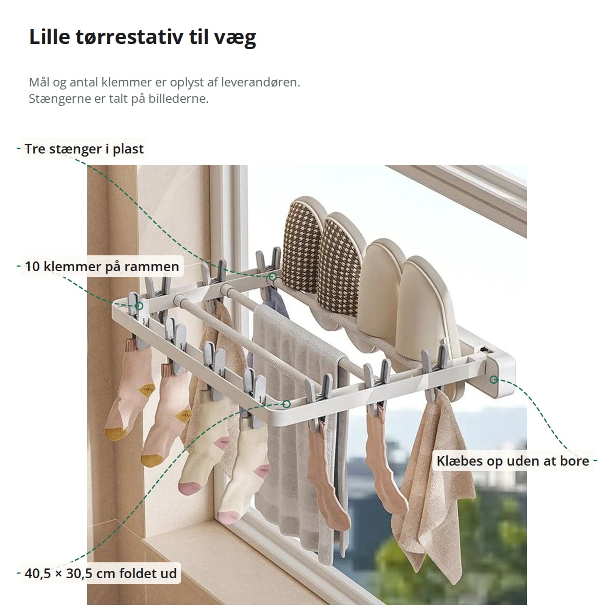 Tørrestativet med markeringer: tre stænger i plast, 10 klemmer på rammen, klæbebeslag uden boring og mål på 40,5 × 30,5 cm