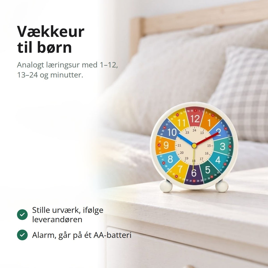 Vækkeur til børn med farverig skive, tal 1–12, 13–24 og minutter på et hvidt natbord i et lyst børneværelse